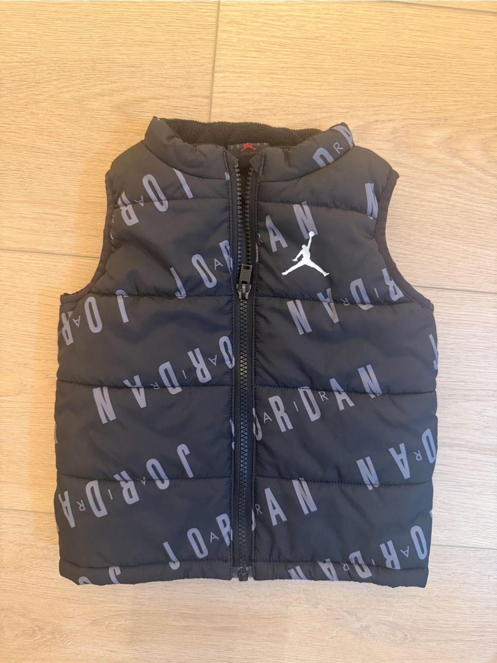 Air Jordan Kids Black Puffer Vest with Gray Logo Print